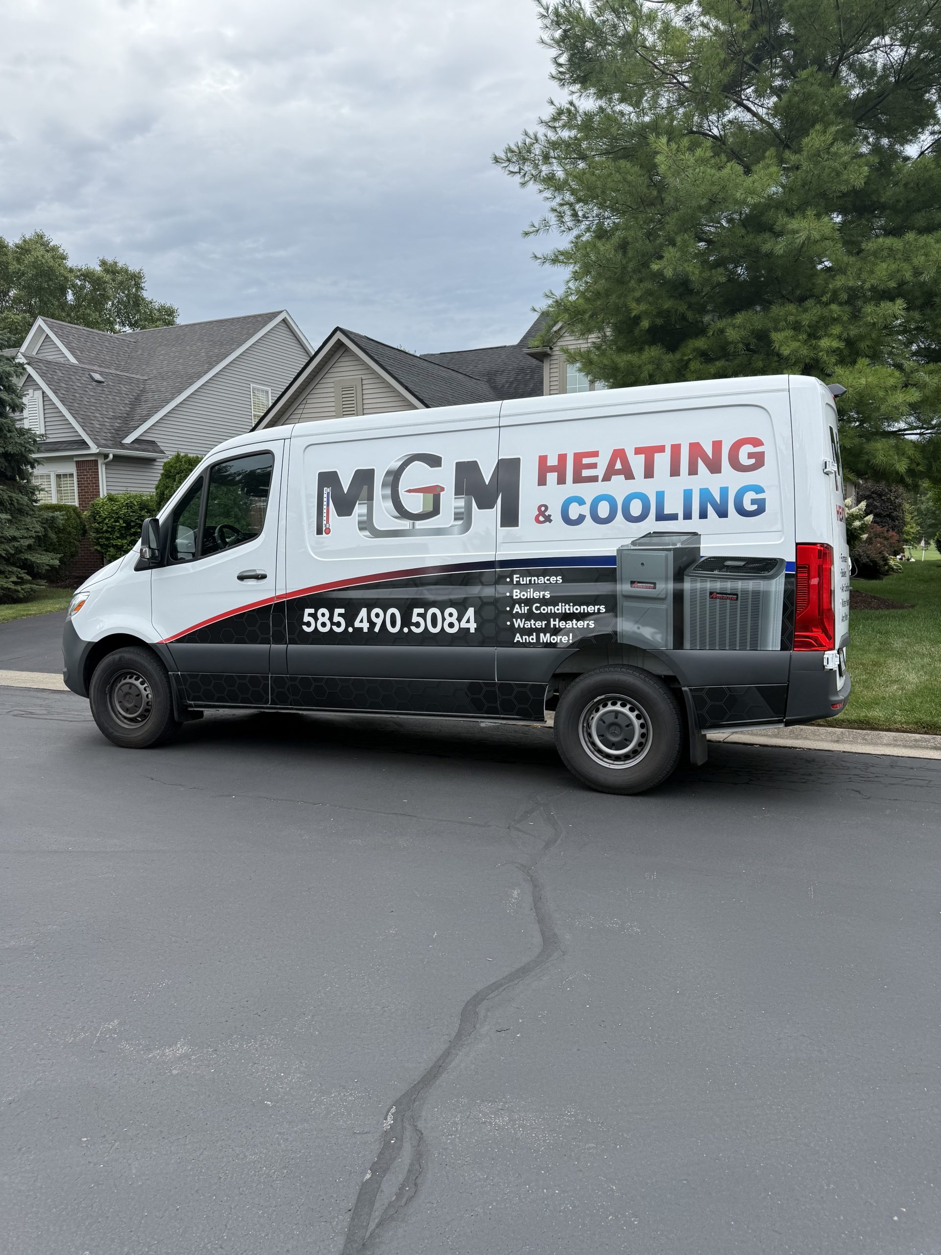 MGM Heating & Cooling branded service truck in Penfield NY