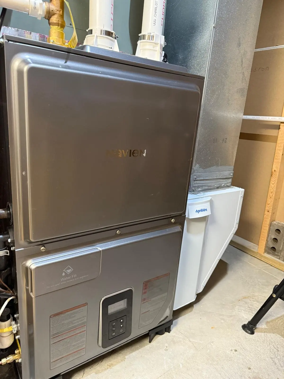 High-efficiency Navien boiler installed in a Pittsford, NY home by MGM Heating & Cooling.